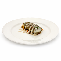Berenjena asada con pure de berenjena, mole y yogur