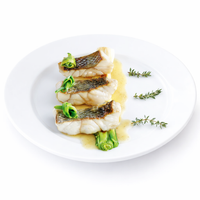 Lubina en salsa meunière con pimientos del piquillo confitados