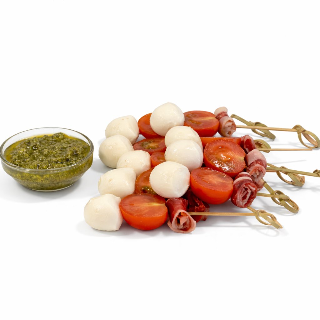 Pack de 20 mini brochetas de mini mozzarella, jamón ibérico, tomate seco.