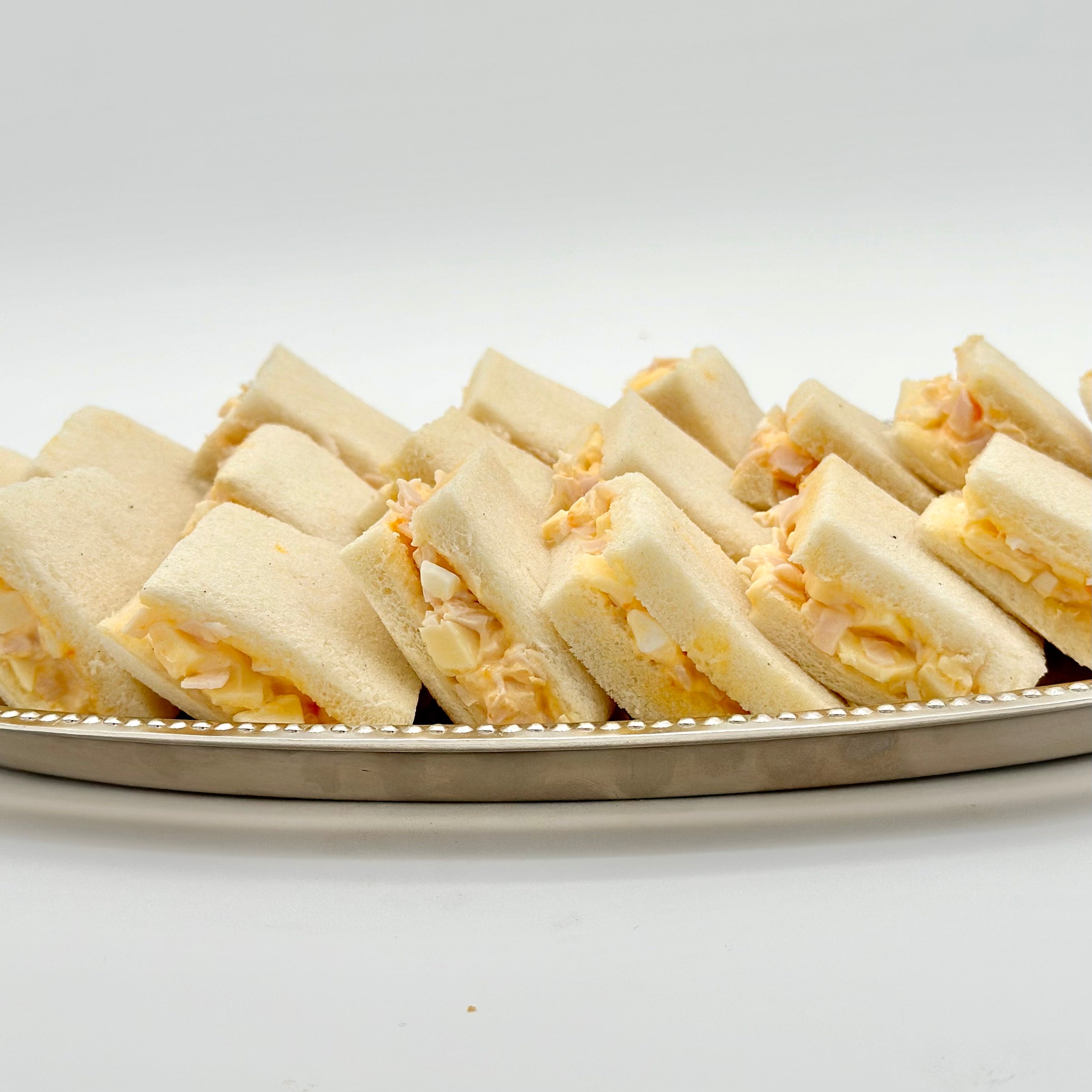 Pack de 8 mini sándwiches de pavo, queso y huevo