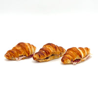 Pack de 3 mini croissants rellenos de jamón ibérico de bellota con tumaca