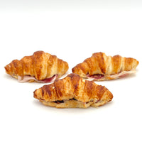 Pack de 3 mini croissants rellenos de jamón ibérico de bellota con tumaca