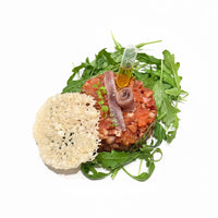 Tartar de tomate, tomate seco, chalotas y vinagreta de yuzu